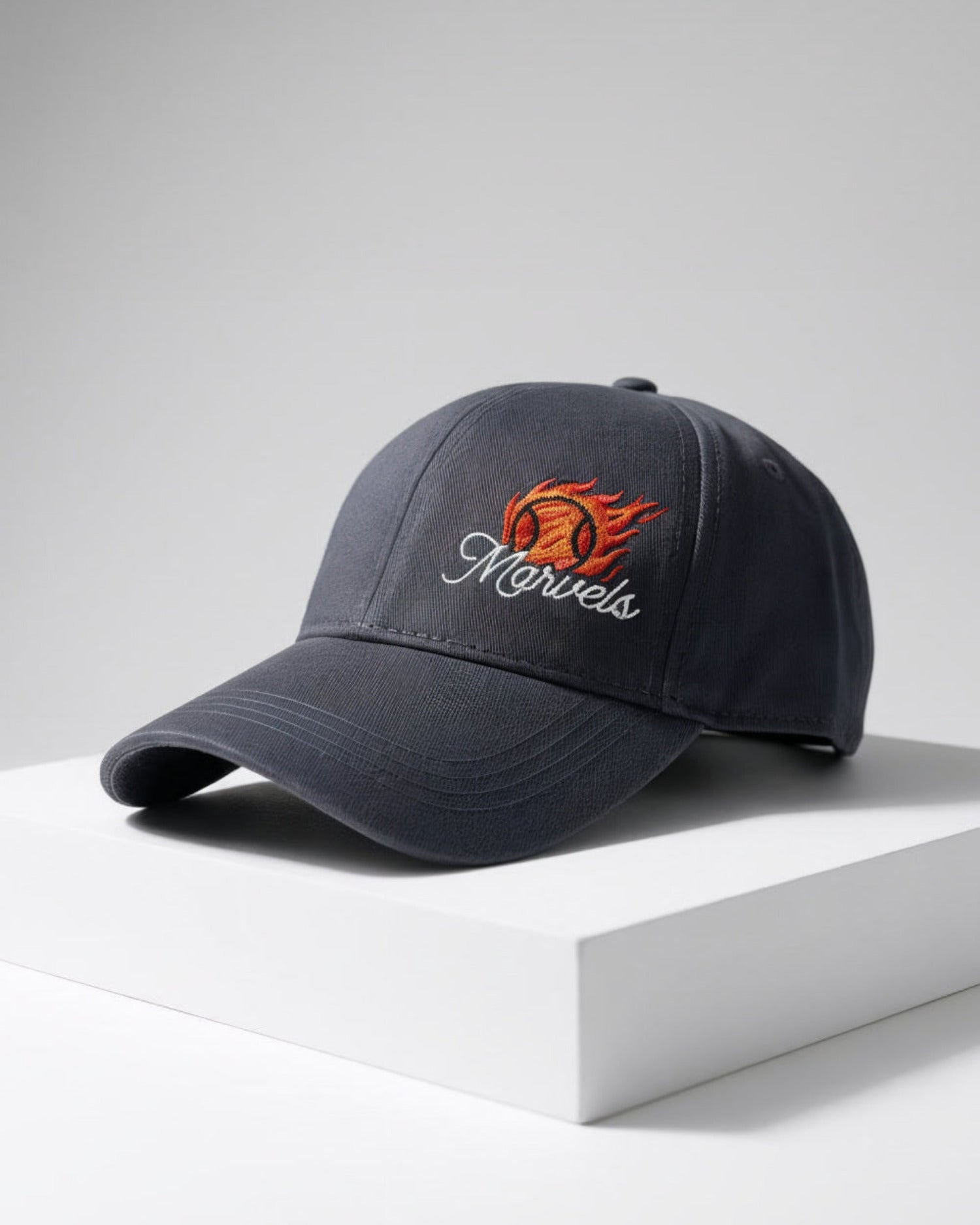 Slate gray cap with embroidered logo on a white surface