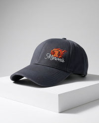 Slate gray cap with embroidered logo on a white surface