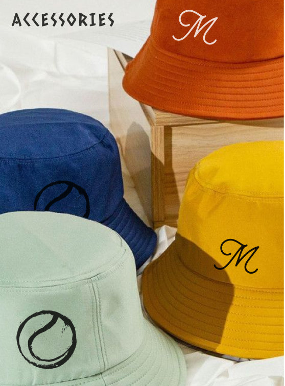 White cap resting on a towel draped over a tennis net post, with a tennis court in the background. Title text reads, 