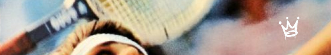 Zoomed in action shot of a tennis serve