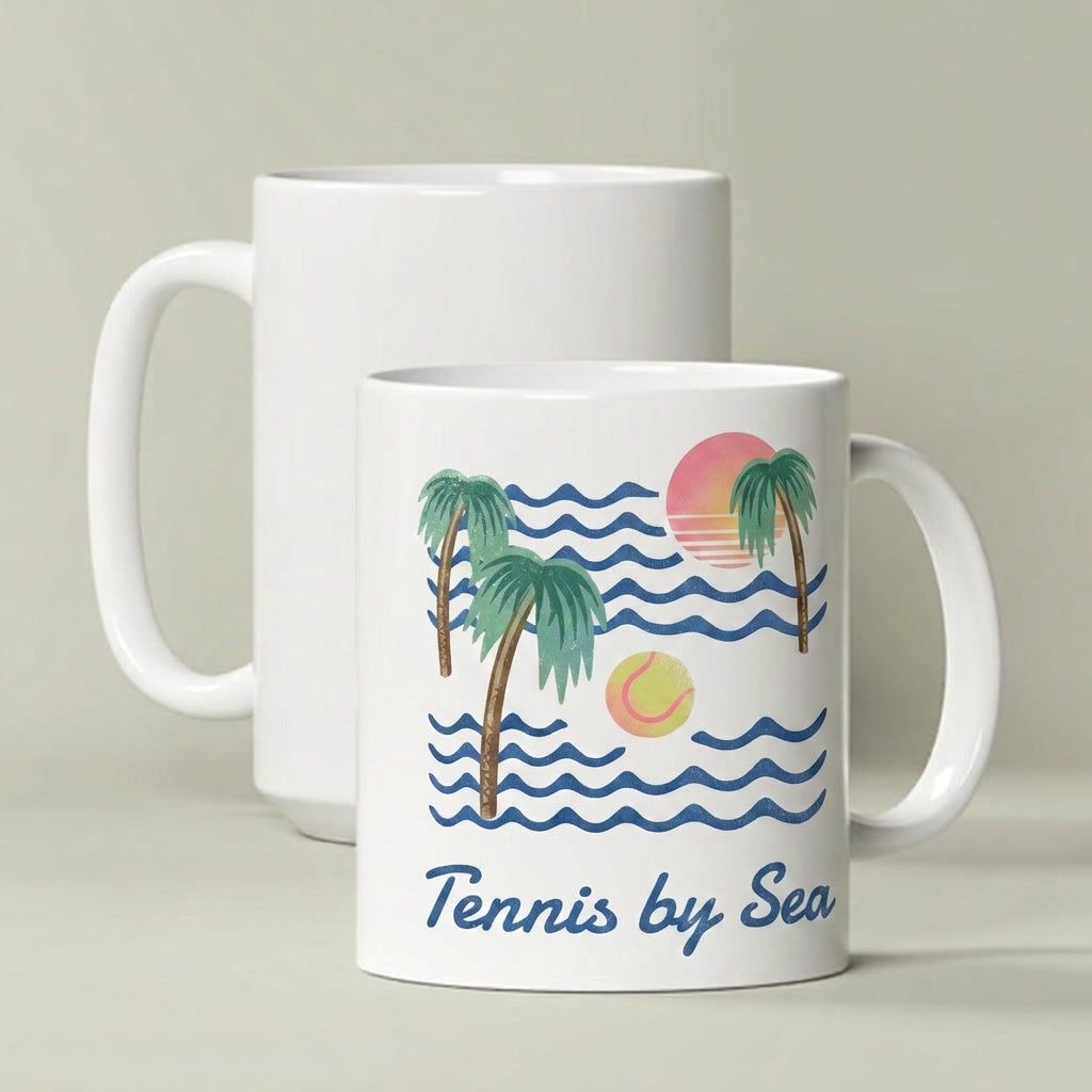 Two white ceramic mugs on a light beige background. The front mug features a colorful graphic of palm trees, blue ocean waves, a pink and yellow sun, and a tennis ball, with the text 'Tennis by Sea' printed below.