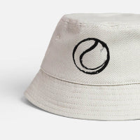 White bucket hat with a tennis ball graphic in black thumbnail 1