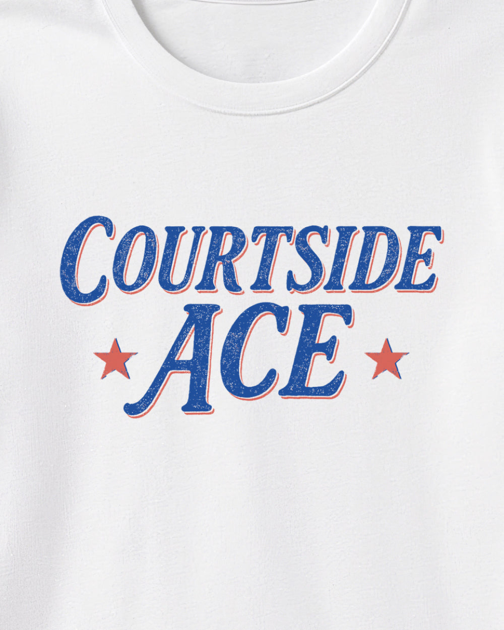 White t-shirt with 'Courtside ACE' text in blue and red on a white background