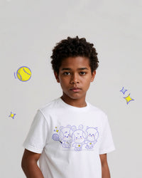 Child wearing a white t-shirt with cartoon tennis ball characters