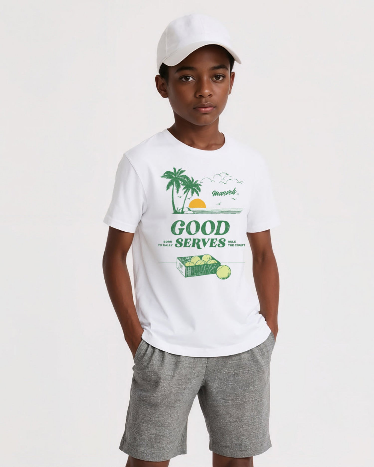 Boy wearing a white t-shirt with a tennis graphic design and text