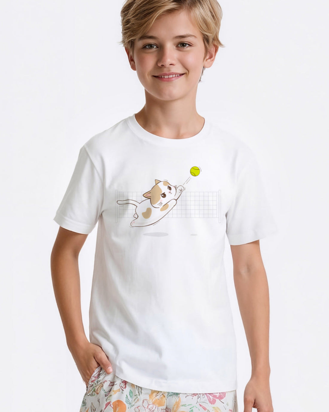 Child wearing a white t-shirt with a tennis cat graphic