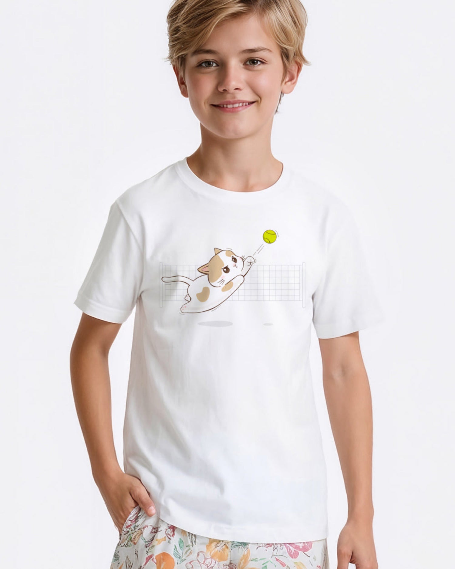Child wearing a white t-shirt with a tennis cat graphic