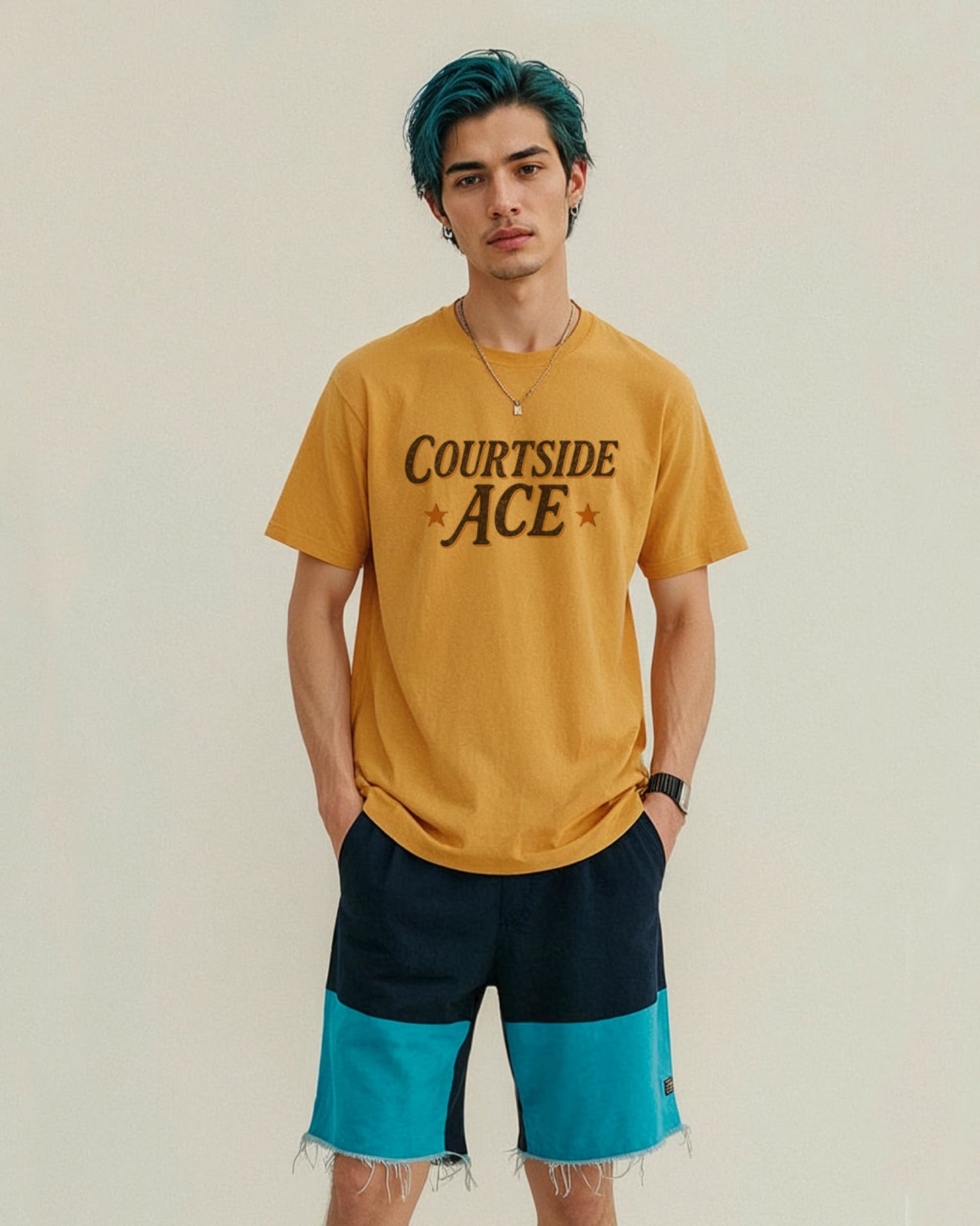 Person wearing a gold yellow t-shirt with 'Courtside Ace' text and blue and black shorts on a plain background