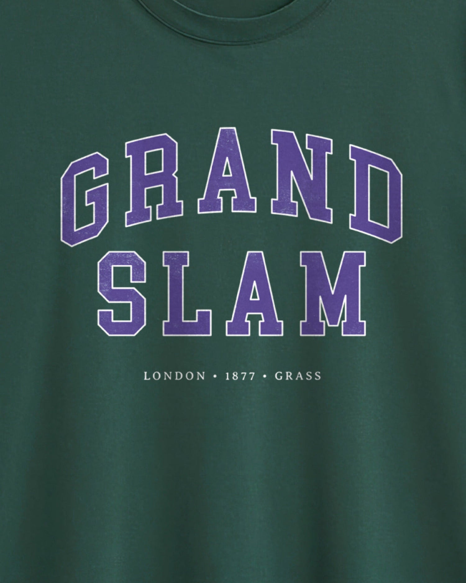 Green t-shirt with 'GRAND SLAM' text in purple